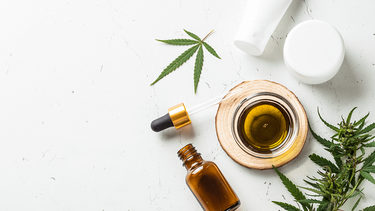 a photo of CBD oil with Cannabis leaf